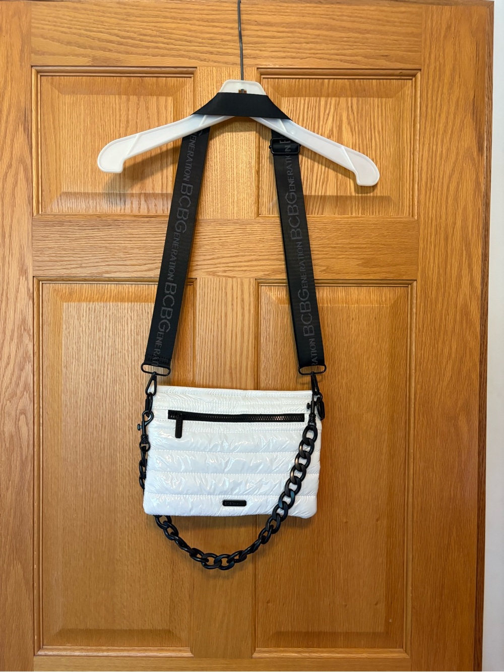 BCBG White Quilted Crossbody Bag with Black Strap and Chain